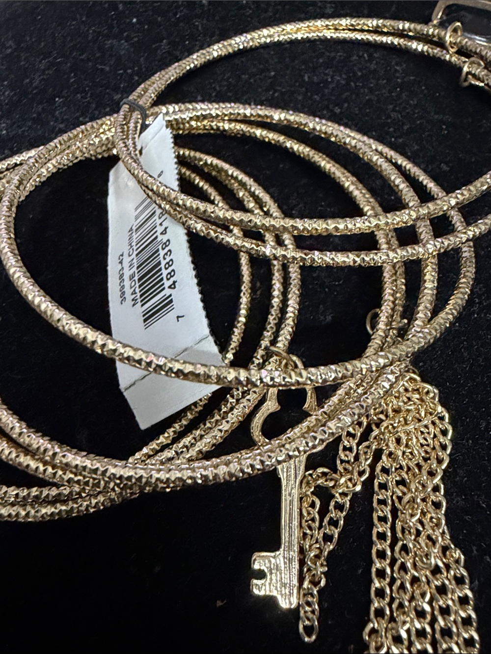Guess Goldtone 13 piece key , Tassle , charms rare